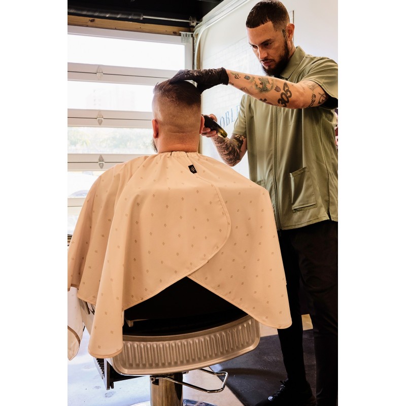 BARBER SHIELD KHAKI CAPE BARBER STRONG